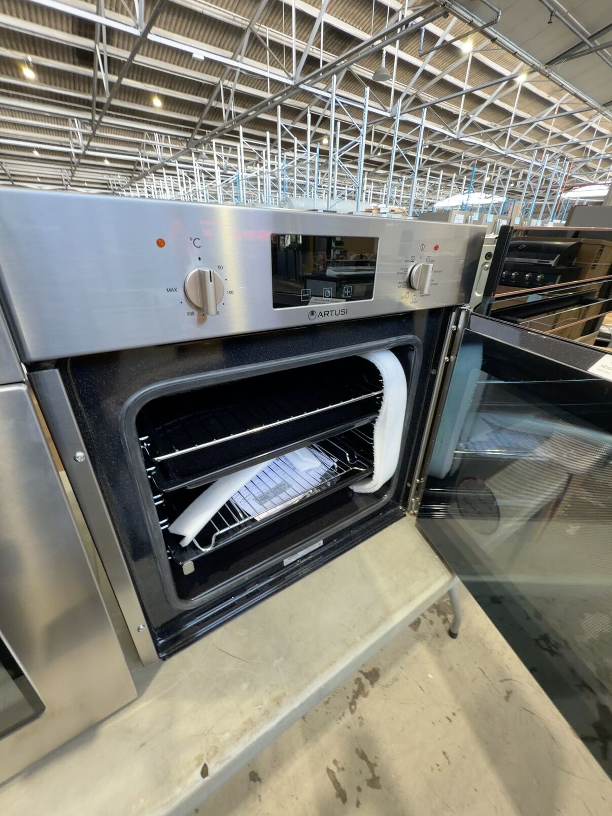 NEW ARTUSI AOS652X 600MM ELECTRIC OVEN WITH SIDE OPENING DOOR, 9 COOKING FUNCTIONS, WITH 2 YEAR WARRANTY NEW ARTUSI AOS652X 600MM ELECTRIC OVEN WITH SIDE OPENING DOOR, 9 COOKING FUNCTIONS, WITH 2 YEAR WARRANTY