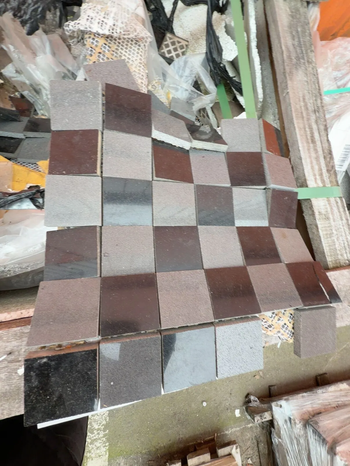PALLET OF BLACK MOSAIC TILES 305MM X 305MM X 10MM SOLD AS IS PALLET OF BLACK MOSAIC TILES 305MM X 305MM X 10MM SOLD AS IS