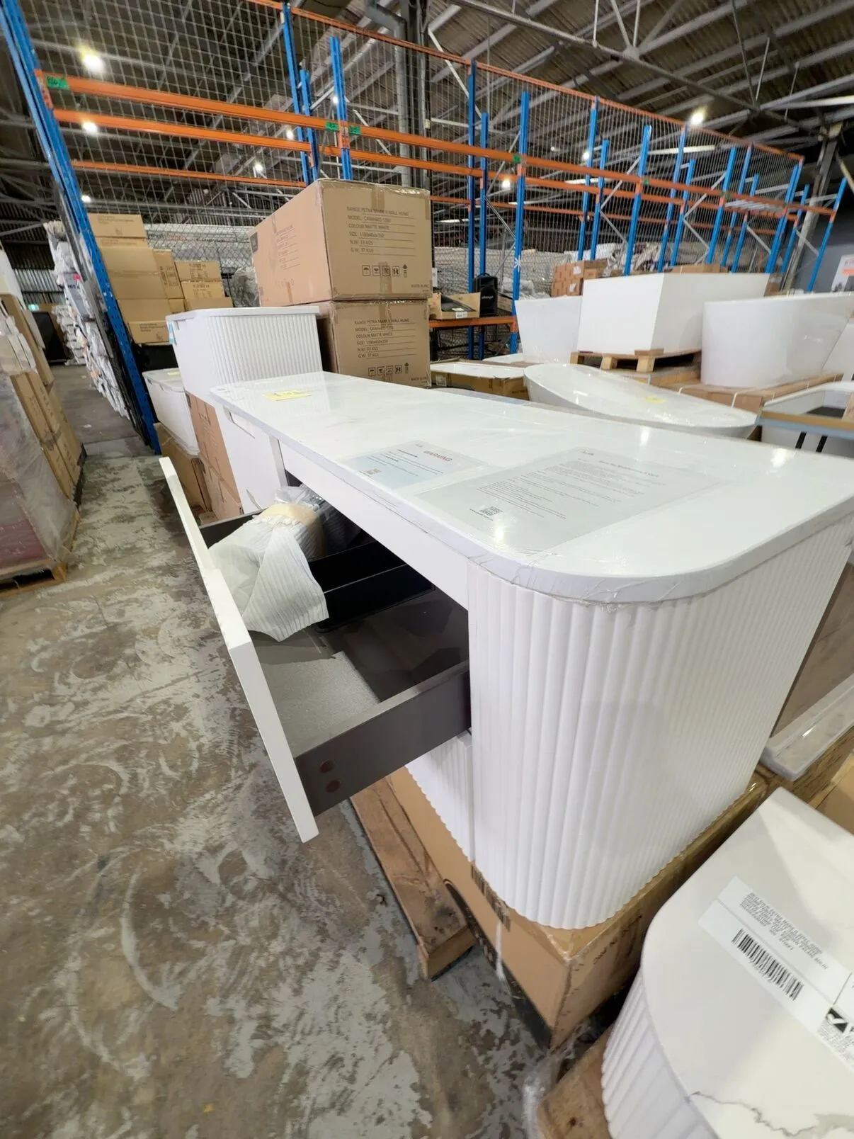 NEW AULIC CURVA 1800MM WALL HUNG VANITY, FLUTED MATTE WHITE, 4 DRAWERS, WITH PURE FLAT STONE TOP RRP$3835 CAWH46-1800D-ST56FT NEW AULIC CURVA 1800MM WALL HUNG VANITY, FLUTED MATTE WHITE, 4 DRAWERS, WITH PURE FLAT STONE TOP RRP$3835 CAWH46-1800D-ST56FT