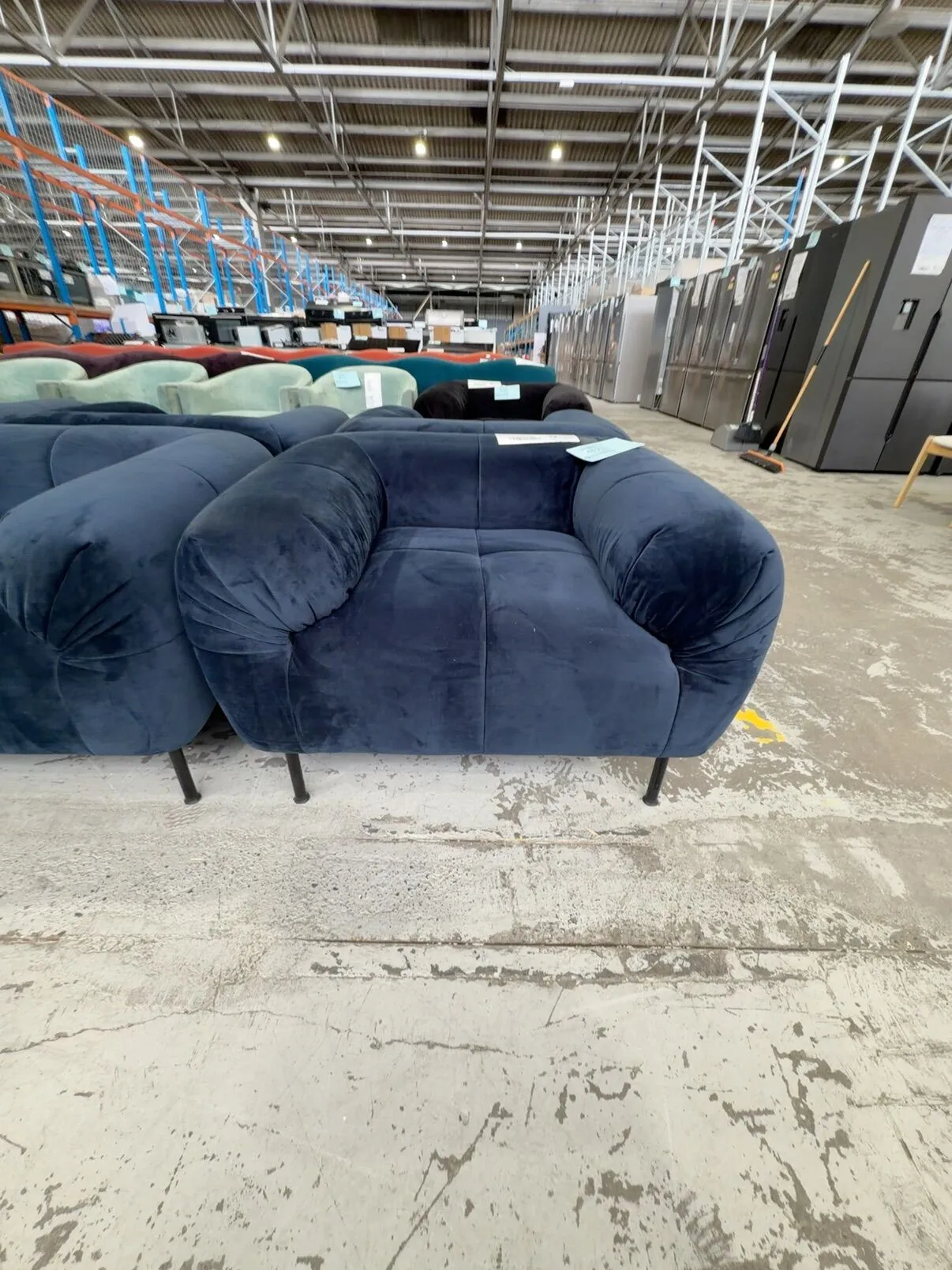 EX HIRE NAVY VELVET ARMCHAIR, SOLD AS IS EX HIRE NAVY VELVET ARMCHAIR, SOLD AS IS