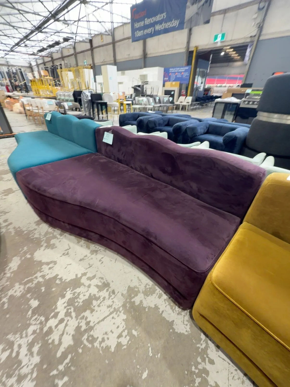EX EVENT HIRE, LARGE PLUM VELVET WAVE SEATING, SOLD AS IS EX EVENT HIRE, LARGE PLUM VELVET WAVE SEATING, SOLD AS IS