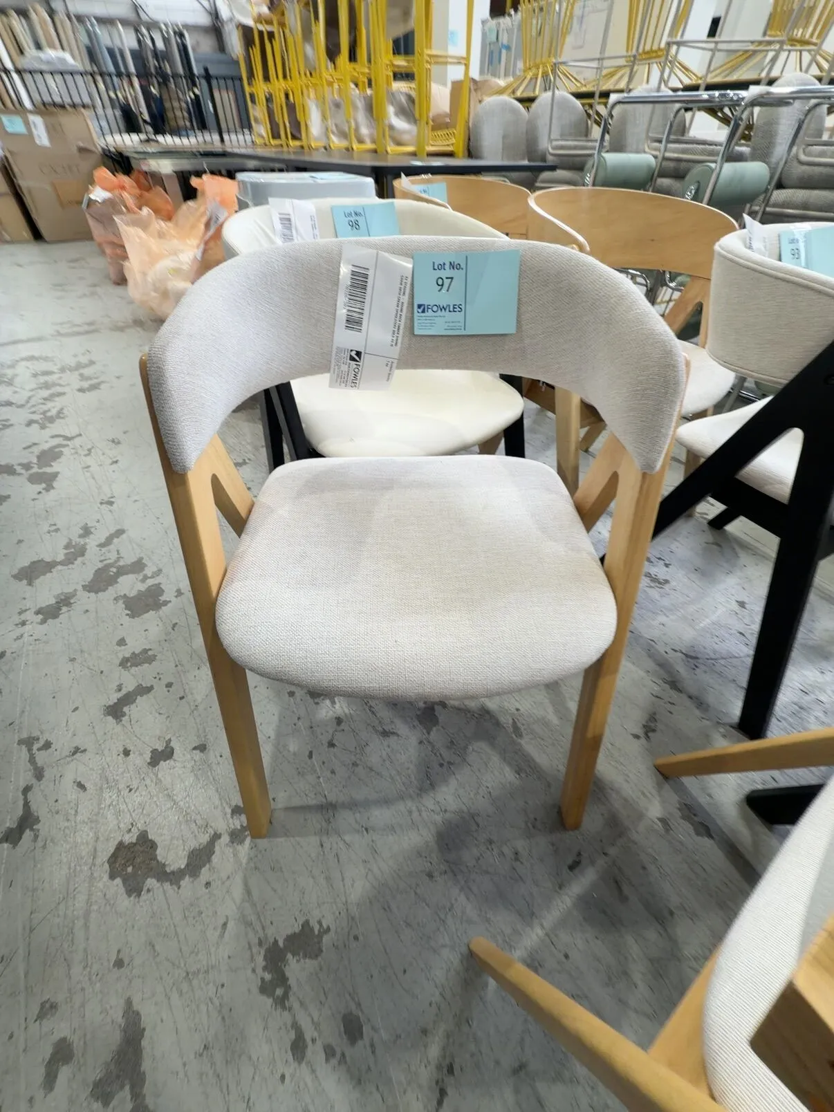 EX STAGING - ROUND BACK TIMBER DINING CHAIR WITH CREAM UPHOLSTERY SOLD AS IS EX STAGING - ROUND BACK TIMBER DINING CHAIR WITH CREAM UPHOLSTERY SOLD AS IS