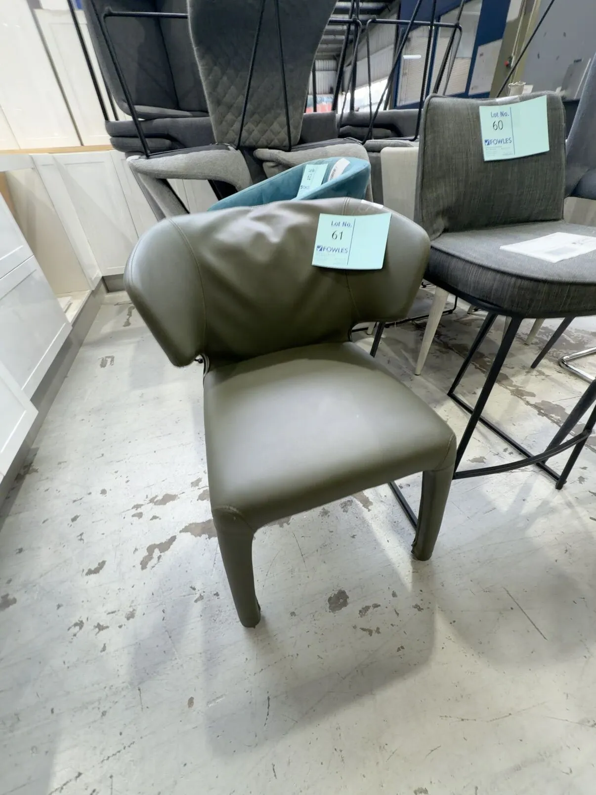 EX STAGING - GREEN PU DINING CHAIR, SOLD AS IS EX STAGING - GREEN PU DINING CHAIR, SOLD AS IS