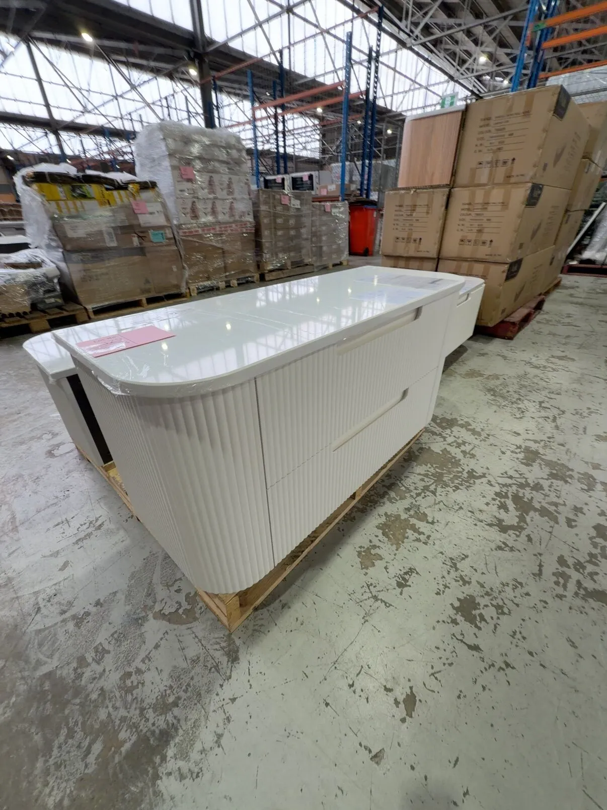 AULIC WALL HUNG CURVA FLUTED MATTE WHITE 2 DRAWER CABINET WITH SOLID SURFACE STONE TOP, RRP$2705 CAWH46-1200-ST56FT AULIC WALL HUNG CURVA FLUTED MATTE WHITE 2 DRAWER CABINET WITH SOLID SURFACE STONE TOP, RRP$2705 CAWH46-1200-ST56FT