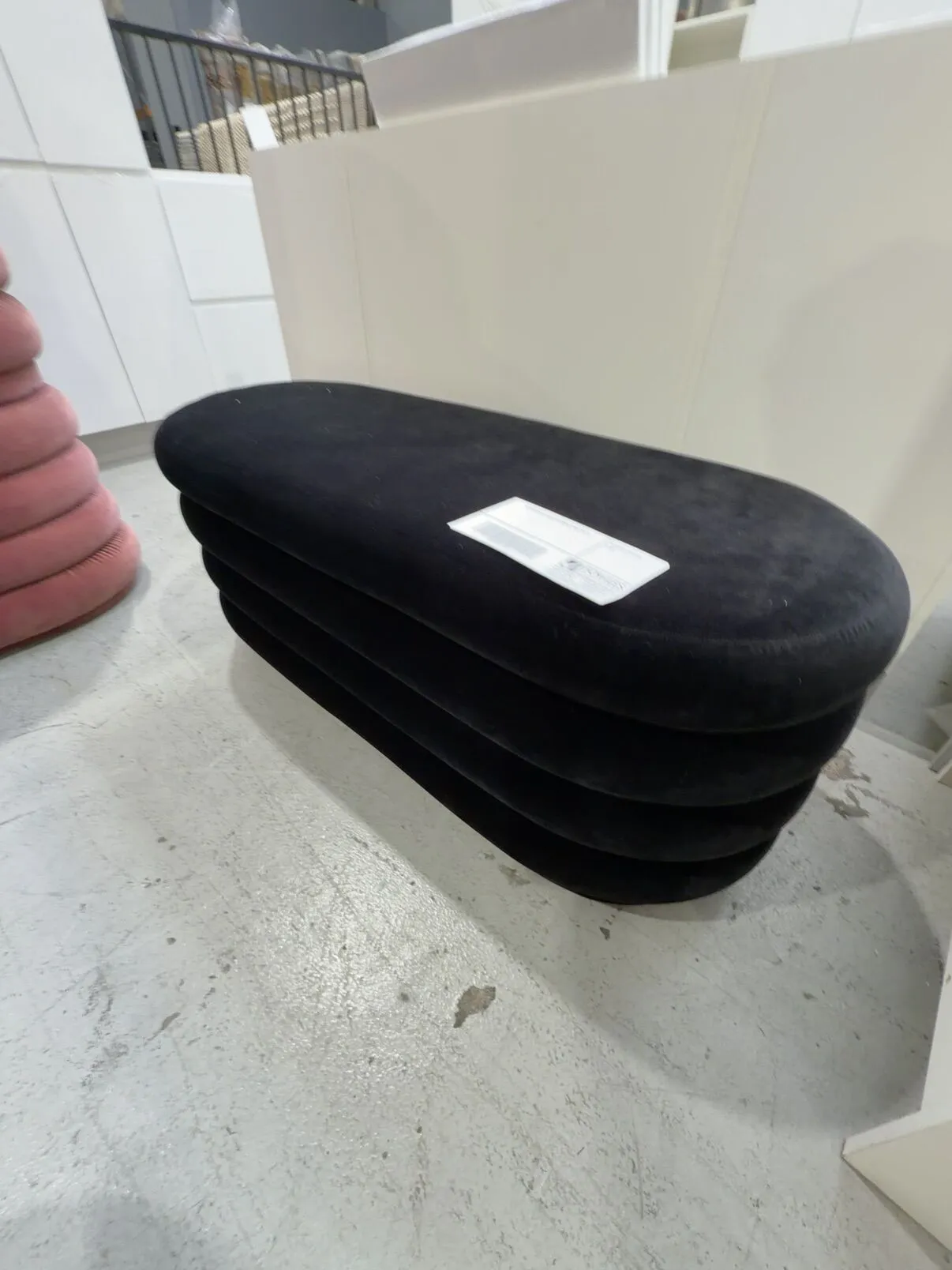 EX HIRE OVAL BLACK OTTOMAN, SOLD AS IS EX HIRE OVAL BLACK OTTOMAN, SOLD AS IS