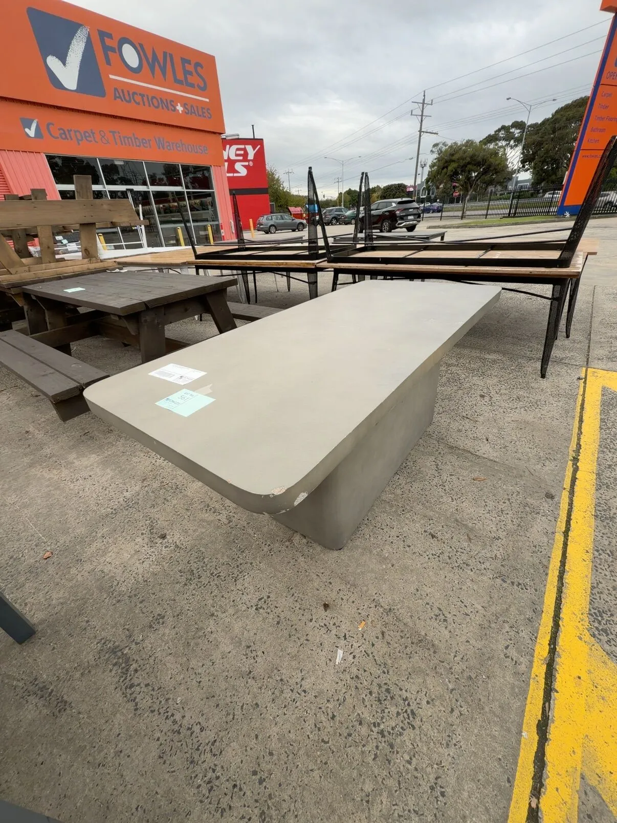 EX STAGING - GREY CONCRETE OUTDOOR TABLE, SOLD AS IS *CHIPPED* EX STAGING - GREY CONCRETE OUTDOOR TABLE, SOLD AS IS *CHIPPED*
