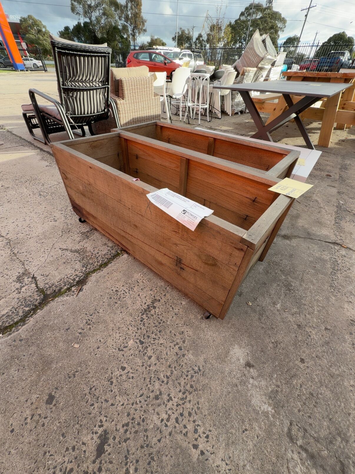 NEW HARDWOOD PLANTER BOX WITH CASTOR WHEELS, STAINED JAPAN BLACK, APPROX 1100MM X 450MM NEW HARDWOOD PLANTER BOX WITH CASTOR WHEELS, STAINED JAPAN BLACK, APPROX 1100MM X 450MM