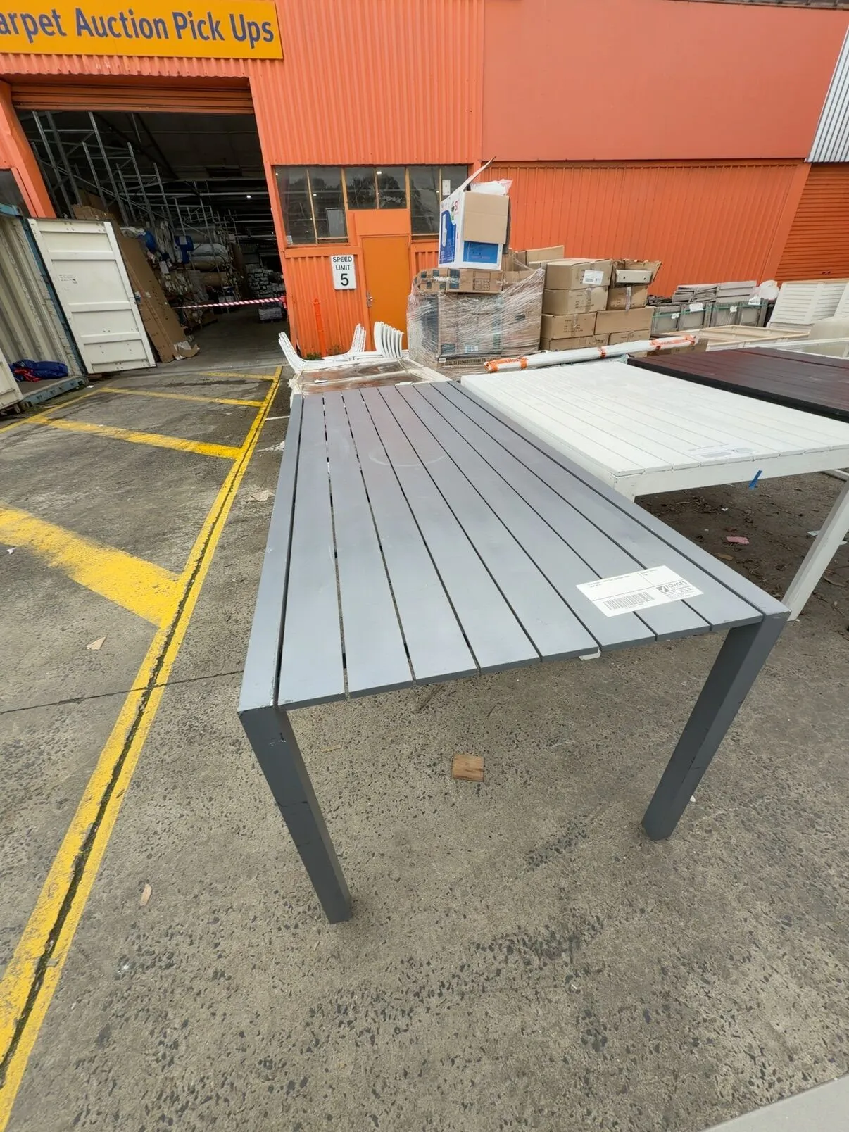 EX STAGING - GREY SLAT OUTDOOR TABLE, SOLD AS IS EX STAGING - GREY SLAT OUTDOOR TABLE, SOLD AS IS