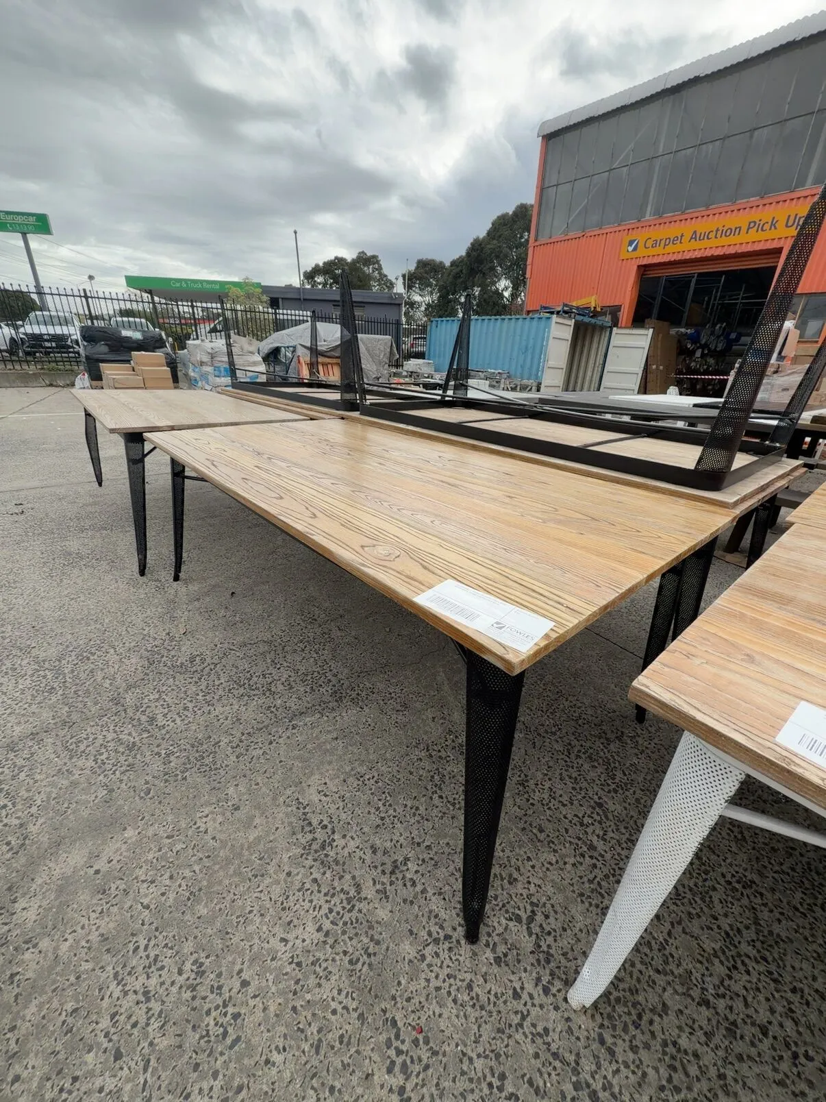 EX STAGING - TIMBER OUTDOOR TABLE WITH BLACK METAL FRAME 2400MM SOLD AS IS EX STAGING - TIMBER OUTDOOR TABLE WITH BLACK METAL FRAME 2400MM SOLD AS IS