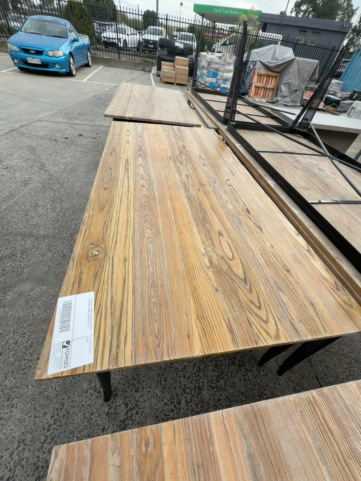 EX STAGING - TIMBER OUTDOOR TABLE WITH BLACK METAL FRAME 2400MM SOLD AS IS EX STAGING - TIMBER OUTDOOR TABLE WITH BLACK METAL FRAME 2400MM SOLD AS IS