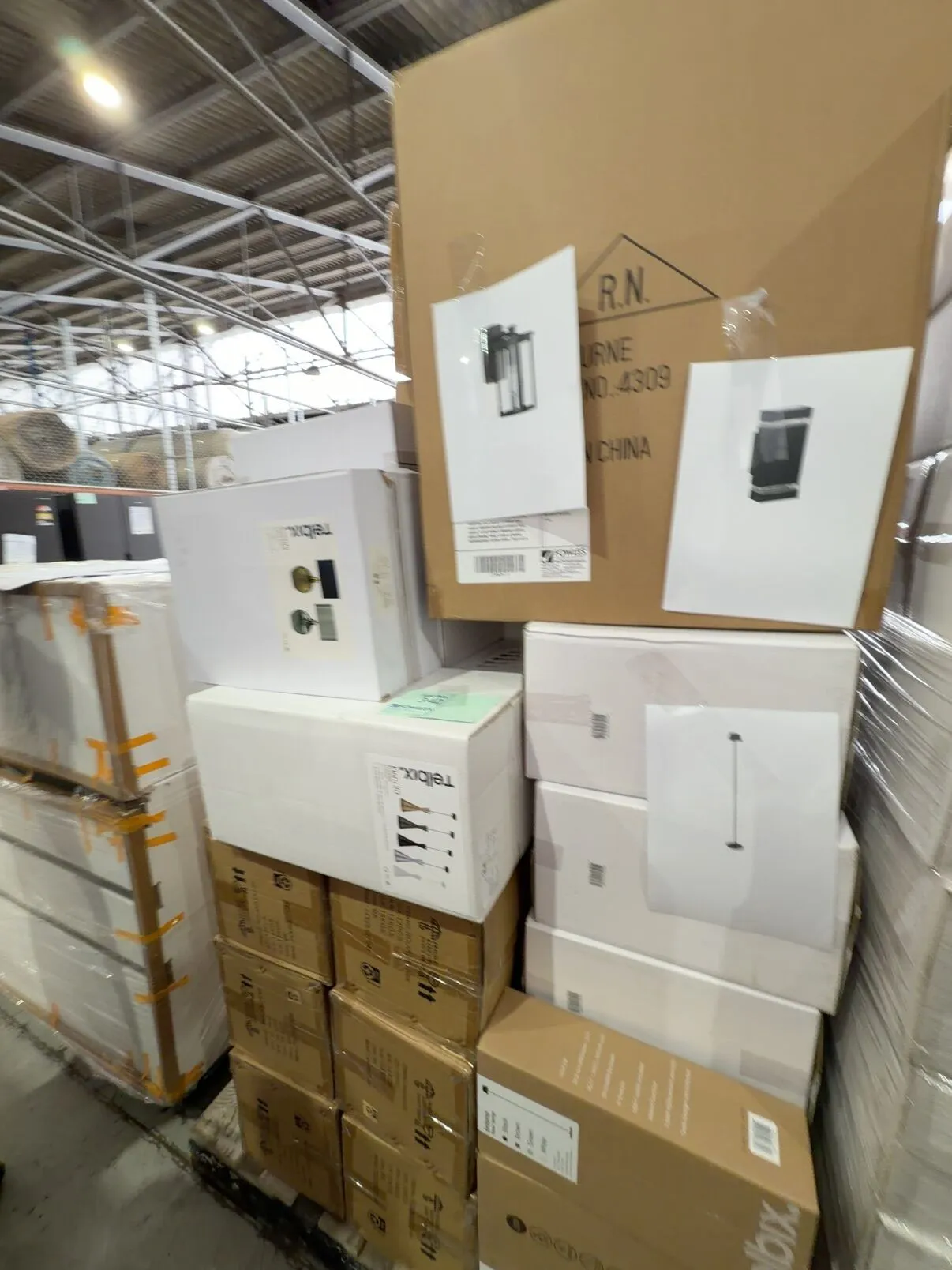 PALLET OF ASSORTED LIGHTING INCLUDING HAMPTON STYLE REESE EXTERIOR WALL LIGHTS, MODERN ROLAND EXTERIOR WALL LIGHTS, FLERO BRONZE PENDANT LIGHTS, AGRA CERAMIC TABLE LAMPS & BRIANA RECHARGEABLE FLOOR LAMPS, SOLD AS IS PALLET OF ASSORTED LIGHTING INCLUDING HAMPTON STYLE REESE EXTERIOR WALL LIGHTS, MODERN ROLAND EXTERIOR WALL LIGHTS, FLERO BRONZE PENDANT LIGHTS, AGRA CERAMIC TABLE LAMPS & BRIANA RECHARGEABLE FLOOR LAMPS, SOLD AS IS