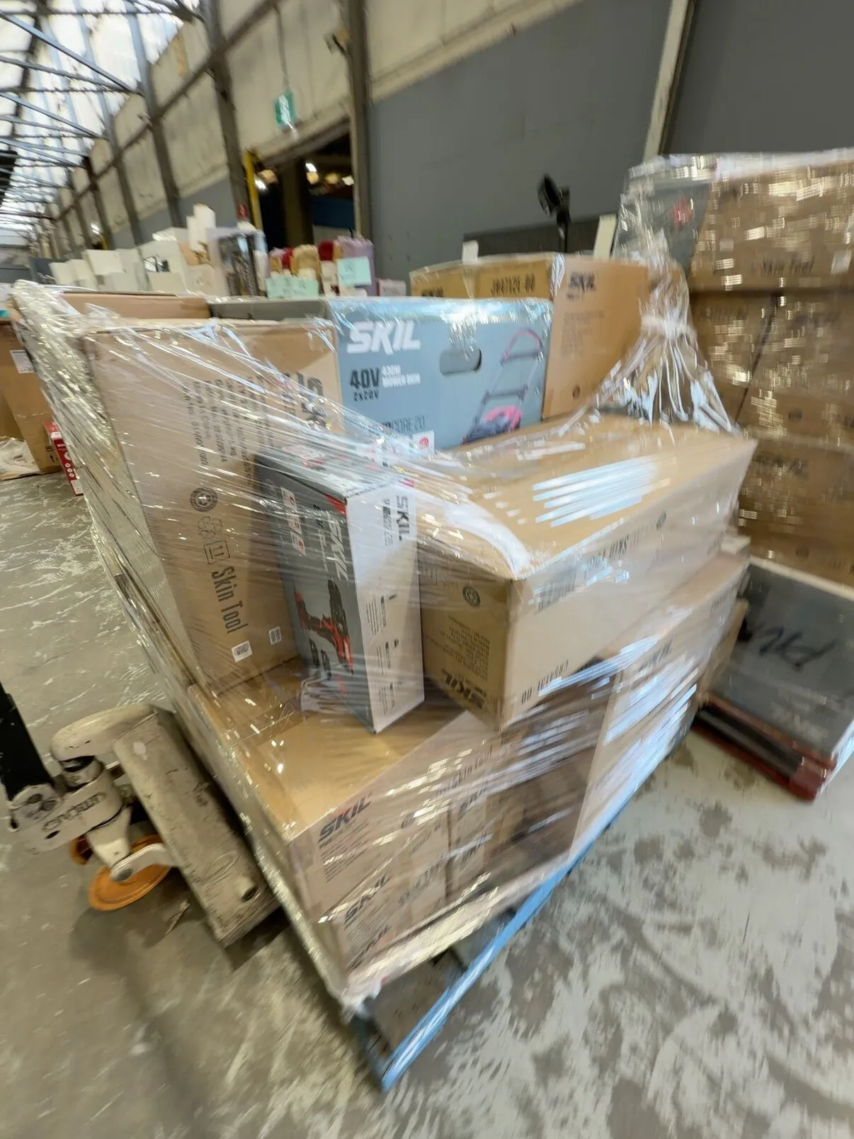 PALLET OF ASSORTED SKIL POWER TOOLS (SKIN ONLY), ALSO INCLUDED ON THIS PALLET ARE SOME SKIL POWER TOOL KITS THAT INCLUDE SOME BATTERIES AND CHARGERS, SOLD AS IS PALLET OF ASSORTED SKIL POWER TOOLS (SKIN ONLY), ALSO INCLUDED ON THIS PALLET ARE SOME SKIL POWER TOOL KITS THAT INCLUDE SOME BATTERIES AND CHARGERS, SOLD AS IS