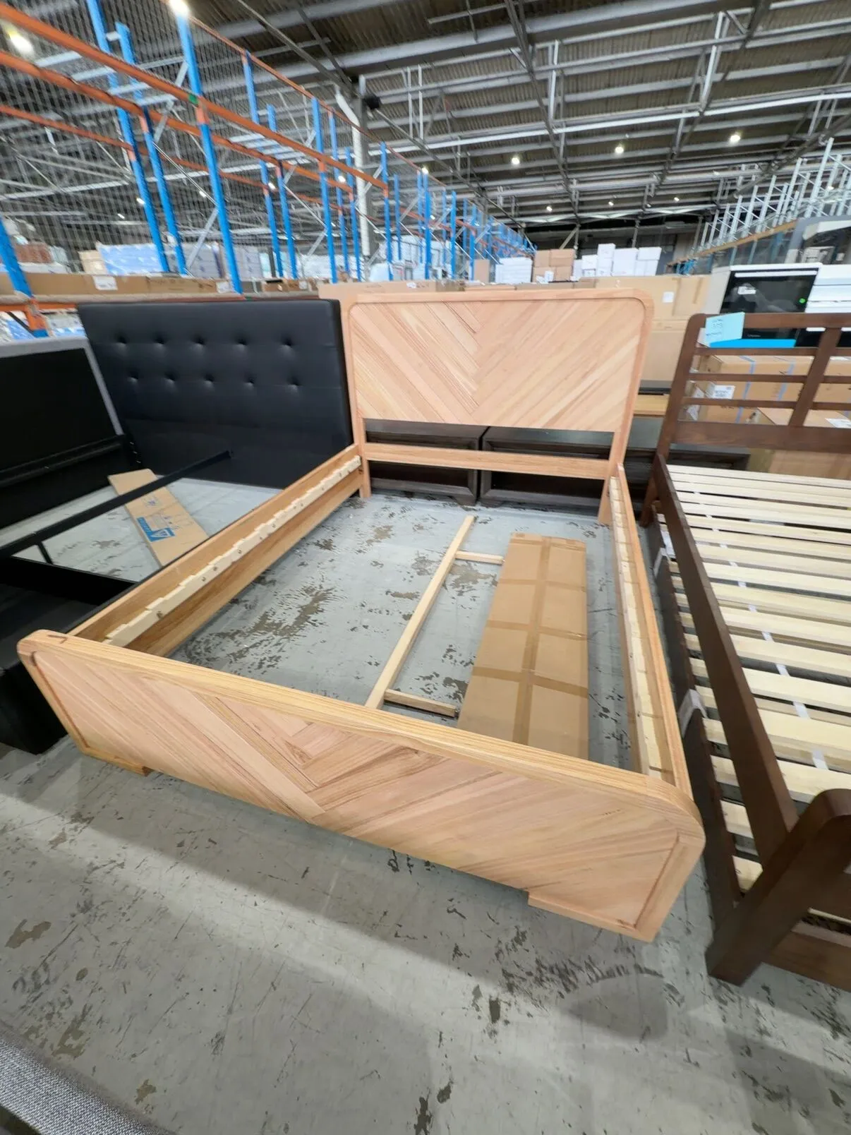 EX DISPLAY EVA QUEEN MESSMATE CURVED TIMBER BEDFRAME, WITH HERRINGBONE HEADBOARD, SOLD AS IS EX DISPLAY EVA QUEEN MESSMATE CURVED TIMBER BEDFRAME, WITH HERRINGBONE HEADBOARD, SOLD AS IS