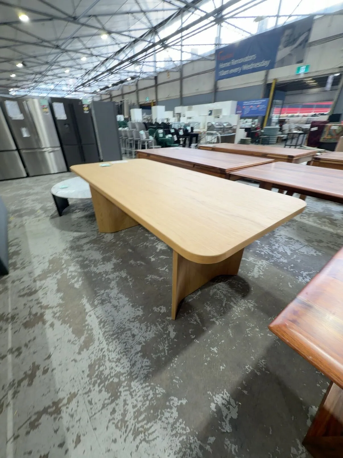 EX DISPLAY ASTON 2100MM CURVED AMERICAN OAK DINING TABLE, SOLD AS IS EX DISPLAY ASTON 2100MM CURVED AMERICAN OAK DINING TABLE, SOLD AS IS