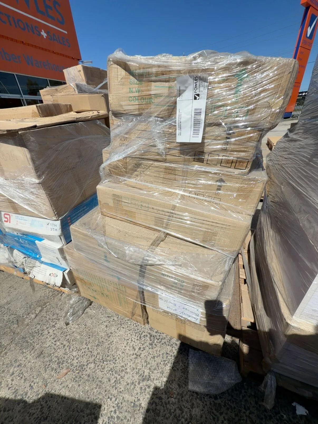 PALLET OF ASSORTED BATHROOM VANITY BASES & MIRRORS ONLY SOLD AS IS PALLET OF ASSORTED BATHROOM VANITY BASES & MIRRORS ONLY SOLD AS IS