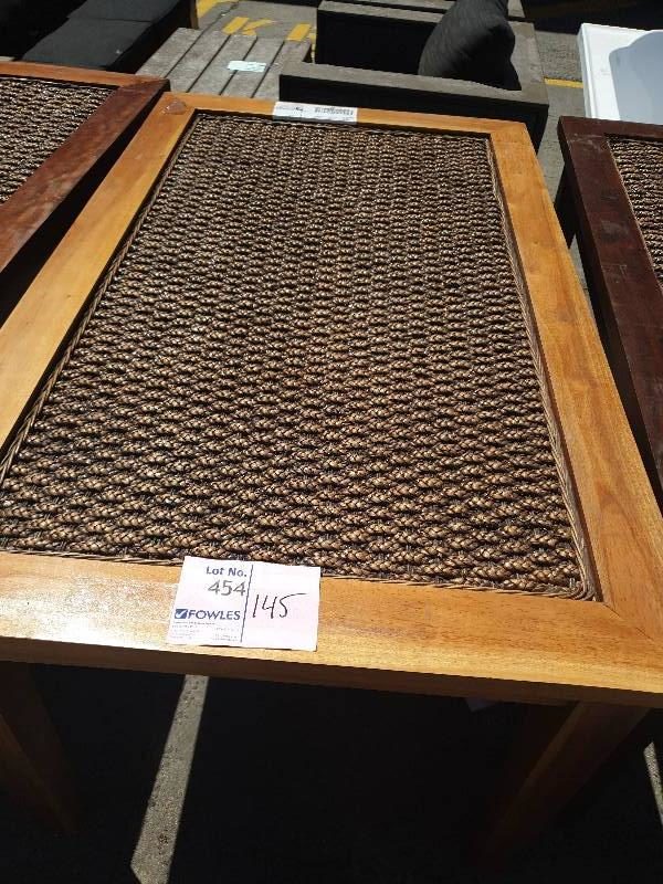 MAHOGANY TIMBER DINING TABLE WITH RATTAN INSET NO GLASS SUPPLIED SOLD AS IS