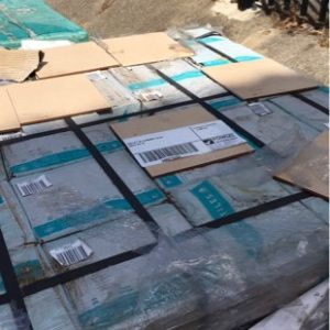 PALLET OF ALMOND TILES SOLD AS IS