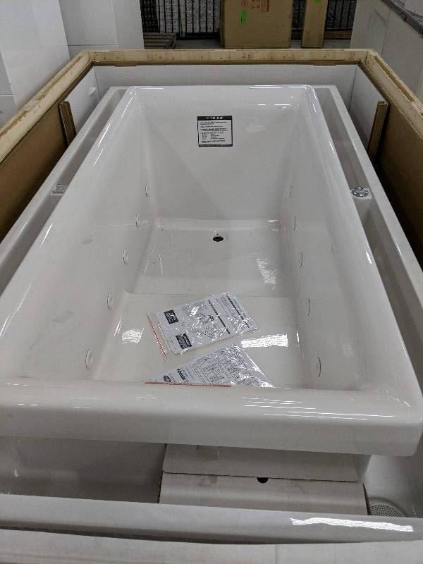 KOHLER SOK WHIRLPOOL BATH 1905MM X 1000MM RIGHT HAND WITH A CONTINOUS FLOW OF WATER CASCADING OVER THE SIDES OF THE BASIN THE SOK BATH OFFERS WHOLE BODY IMMERSION RRP$15499