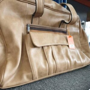 BRAND NEW CAARELS TRAVEL BAG WITH DUST COVER - CARAMEL