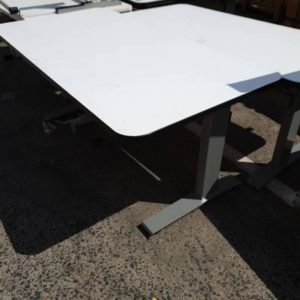 EX HIRE WHITE ADJUSTABLE WORK DESK SOLD AS IS