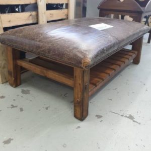 SECOND HAND - LARGE LEATHER OTTOMAN WITH TIMBER FRAME SOLD AS IS