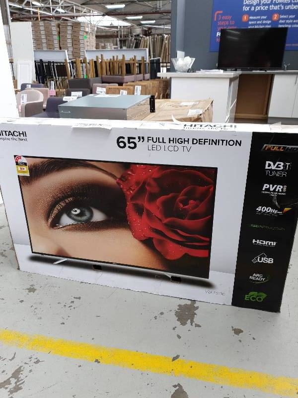 RETAIL RETURNS - HITCHI 65 FULL HD LED TV WITH REMOTE WITH 30 DAY WARRANTY"