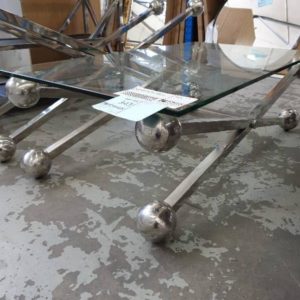 SECOND HAND FURNITURE - GLASS & CHROME COFFEE TABLE WITH CROSS LEGS SOLD AS IS