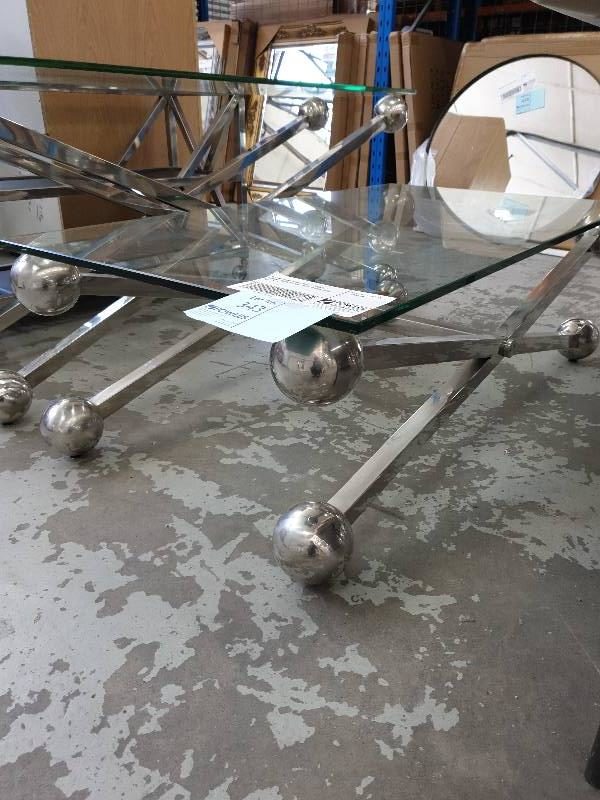 SECOND HAND FURNITURE - GLASS & CHROME COFFEE TABLE WITH CROSS LEGS SOLD AS IS