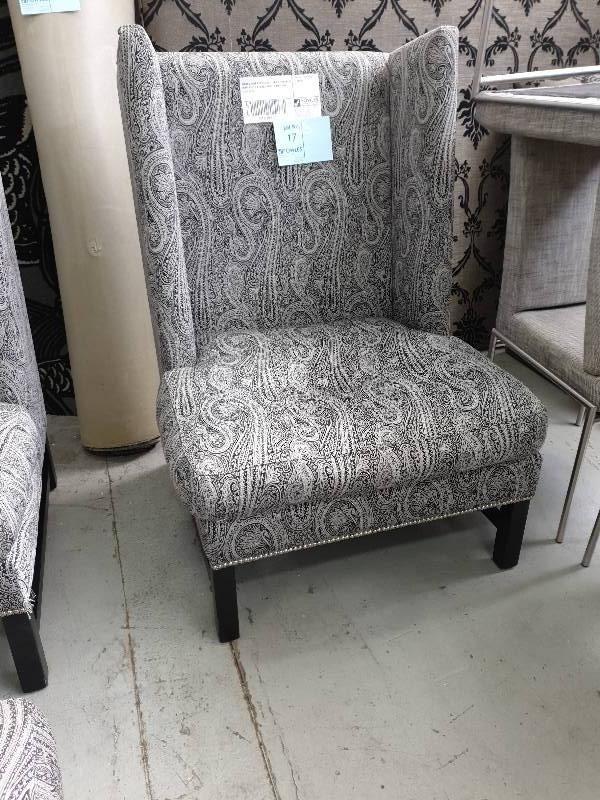 SECOND HAND FURNITURE - LARGE WINGBACK CHAIR SILVER & BLACK PAISELY MATERIAL SOLD AS IS