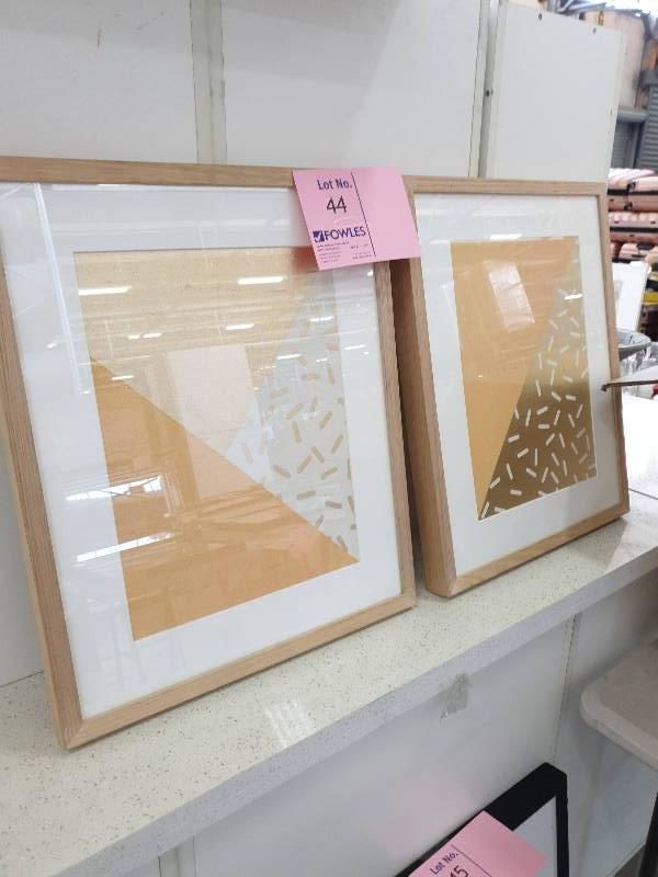 EX DISPLAY HOME FURNITURE - PAIR OF GOLD GEOMETRIC PRINTS OAK FRAME SOLD AS IS