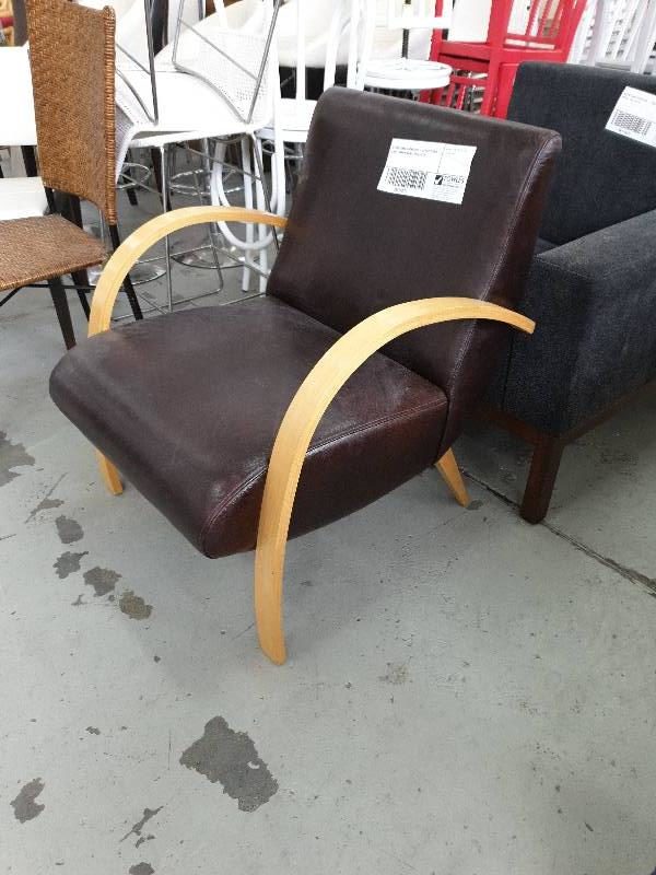 SECOND HAND FURNITURE - LEATHER ARM CHAIR TIMBER ARMS SOLD AS IS