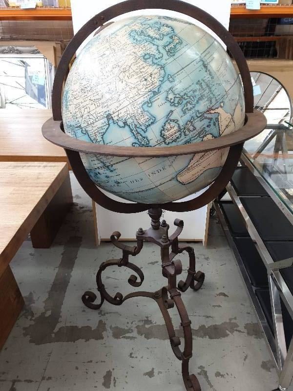 SECOND HAND FURNITURE - LARGE WORLD GLOBE ON WROUGHT IRON STAND SOLD AS IS