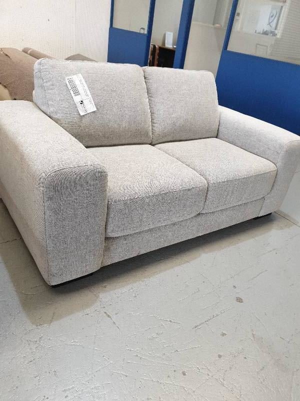 SECOND HAND FURNITURE - GREY MATERIAL UPHOLSTERED 2 SEATER COUCH SOLD AS IS
