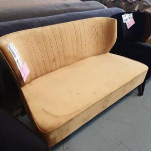 EX HIRE - GOLD UPHOLSTERED 2 SEATER COUCH WITH STUD DETAIL ON BACK SOLD AS IS