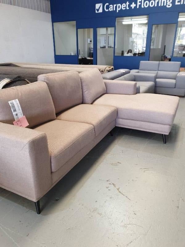 EX DISPLAY HOME FURNITURE - BEIGE MATERIAL 3 SEATER COUCH WITH CHAISE SOLD AS IS