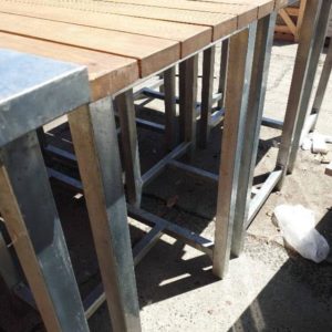 EX FURNITURE HIRE - TIMBER & STEEL BAR TABLE SOLD AS IS DAMAGED SOLD AS IS