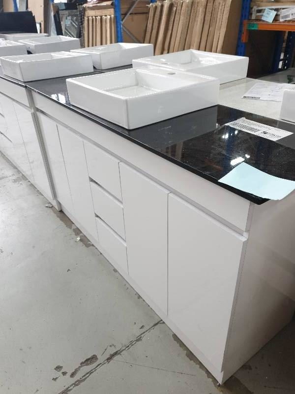 1500MM DOUBLE BOWL VANITY GLOSS WHITE WITH CENTRAL DOORS AND DRAWERS EACH END WITH WHITE STONE BENCH TOP WITH ABOVE COUNTER BOWLS BN1470