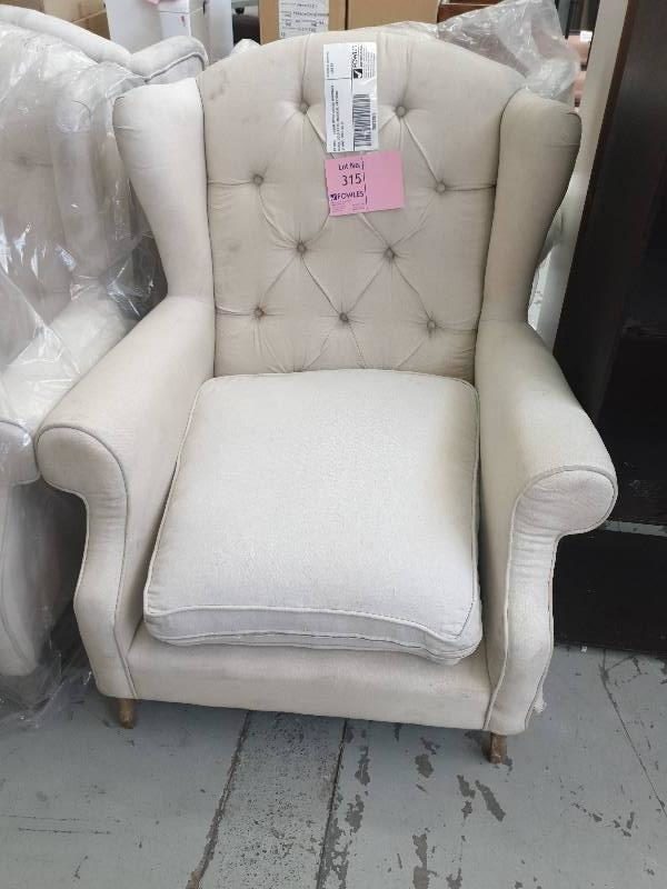 EX HIRE - CREAM UPHOLSTERED WINGBACK CHAIR SOLD AS IS MATERIAL HAS SOME STAINS SOLD AS IS