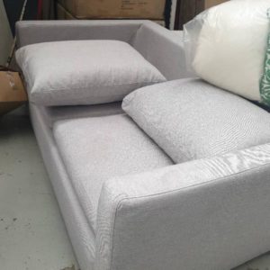 EX FURNITURE HIRE - GREY MATERIAL 2 SEATER COUCH SOLD AS IS
