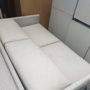 EX FURNITURE HIRE - GREY MATERIAL 2 SEATER COUCH SOLD AS IS