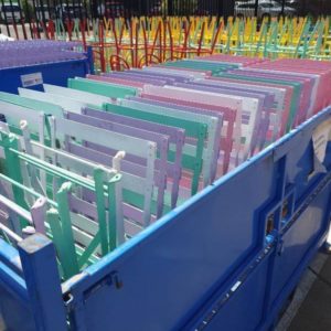 LARGE STILLAGE OF ASSORTED COLOUR FOLDING METAL BAR STOOLS **STILLAGE IS NOT INCLUDED IN THE SALE** SOLD AS IS