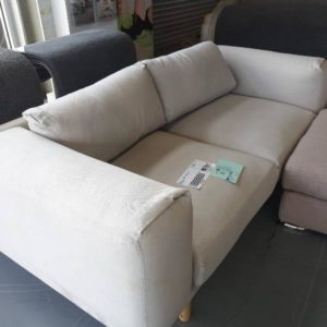 EX HIRE - CREAM 2 SEATER COUCH SOLD AS IS