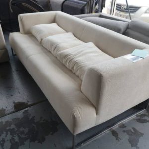 EX HIRE - CREAM 2.5 SEATER COUCH SOLD AS IS