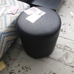 EX HIRE - BLACK PU ROUND OTTOMAN SOLD AS IS