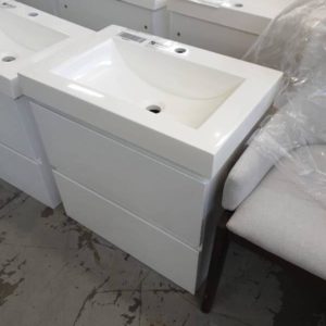 600MM WALL HUNG 2 DRAWER VANITY WITH POLY SQUARE TOP SLIGHTLY OFF COLOUR SOLD AS IS