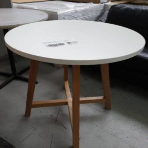 EX OFFICE - WHITE ROUND LAMINATE TABLE WITH TIMBER LEGS SOLD AS IS