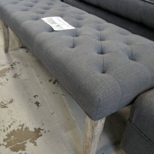 EX HIRE - DARK GREY UPHOLSTERED BUTTON BACK OTTOMAN SOLD AS IS