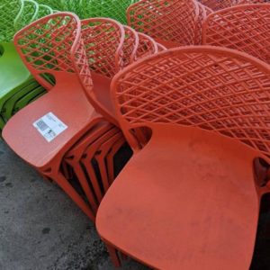 EX HIRE - ORANGE ACRYLIC CHAIR STACKABLE SOLD AS IS