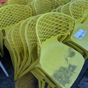 EX HIRE - YELLOW ACRYLIC CHAIR STACKABLE SOLD AS IS
