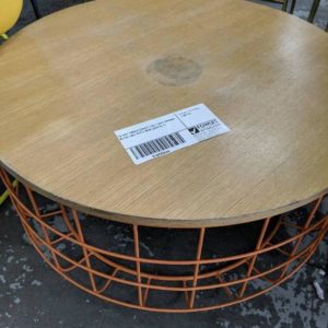 EX HIRE TIMBER COFFEE TABLE WITH ORANGE METAL CAGE STYLE BASE SOLD AS IS